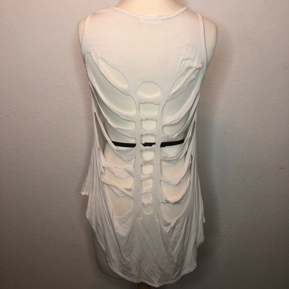White sheet sleeveless top with back detail